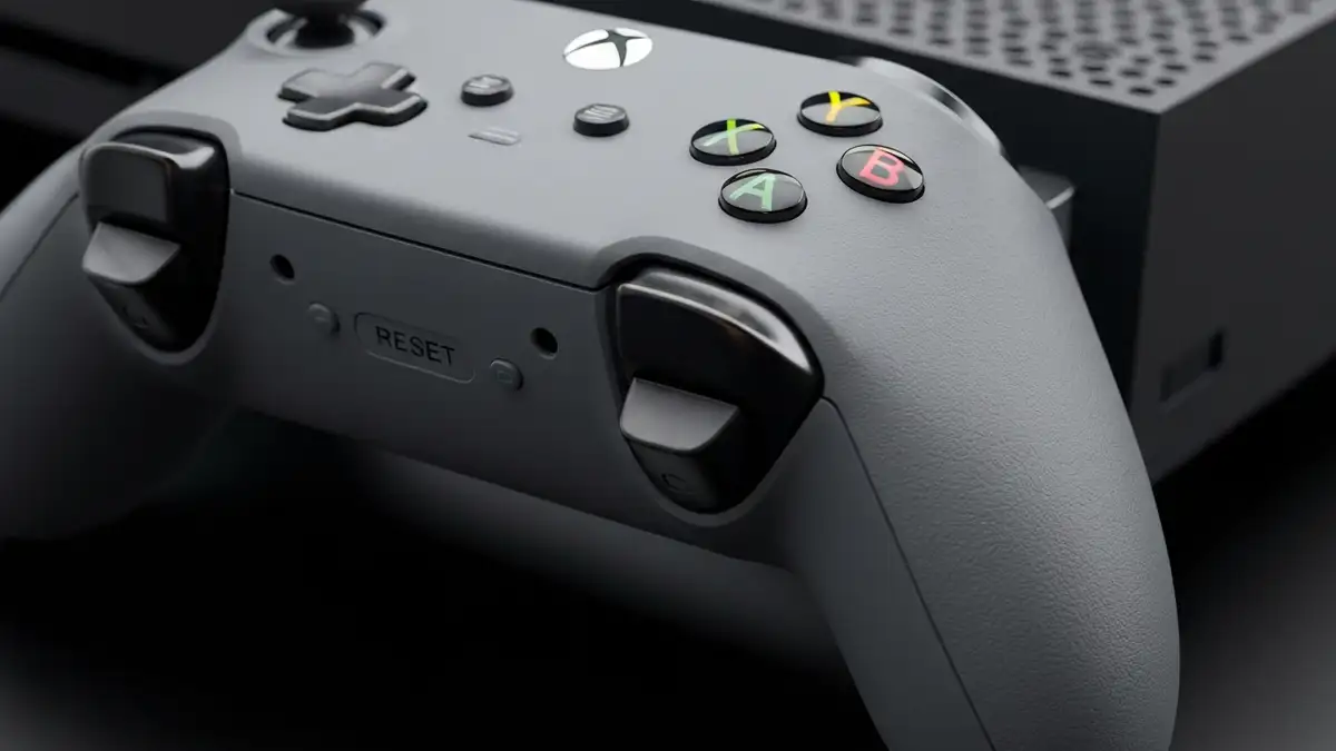 Xbox kontroler bezprzewodowy z przyciskiem reset na tylnej obudowie, konsola Xbox w tle